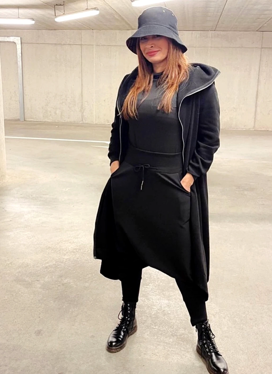 Lubna in her signature black style